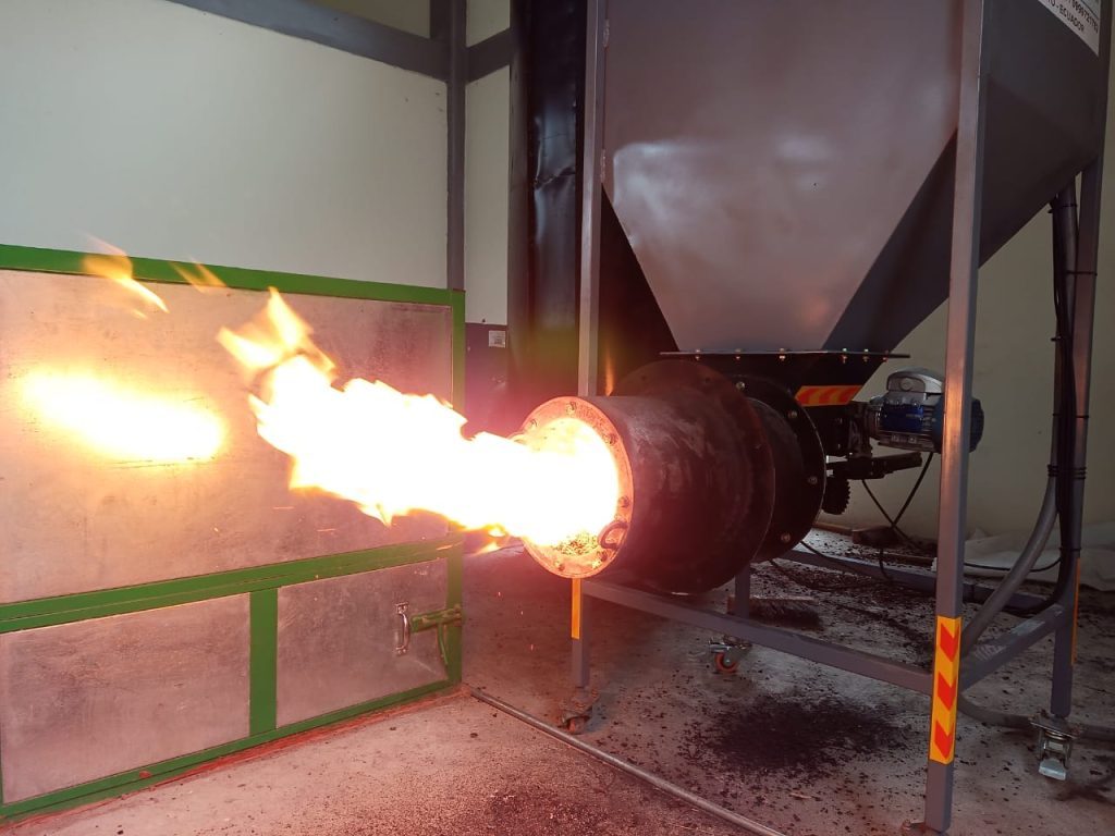 What does a pyrolysis reactor do with the gas it produces Syngas, flare, bio-oil and wood vinegar